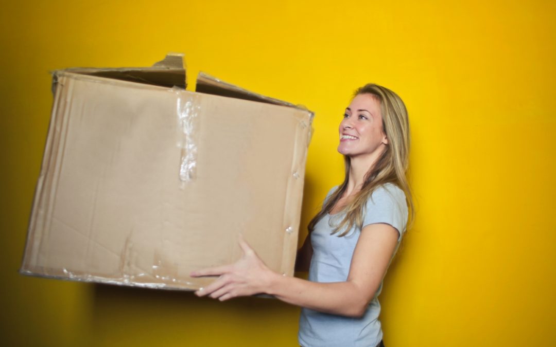 woman holding a box